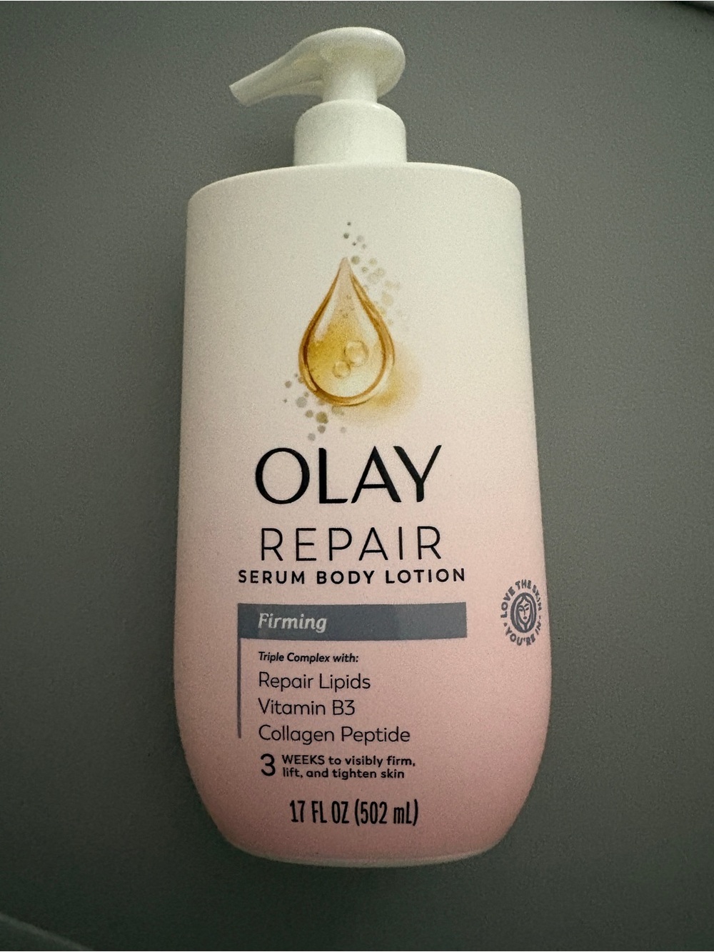 OLAY Repair Serum Body Lotion - Pink and Gold Accents